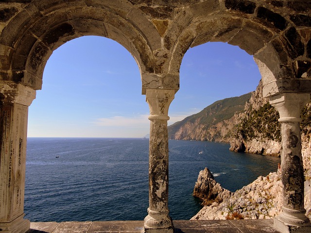 Scolgio near a sea. "Scoglio" is an Italian word that translates to "rock" or "cliff" in English.